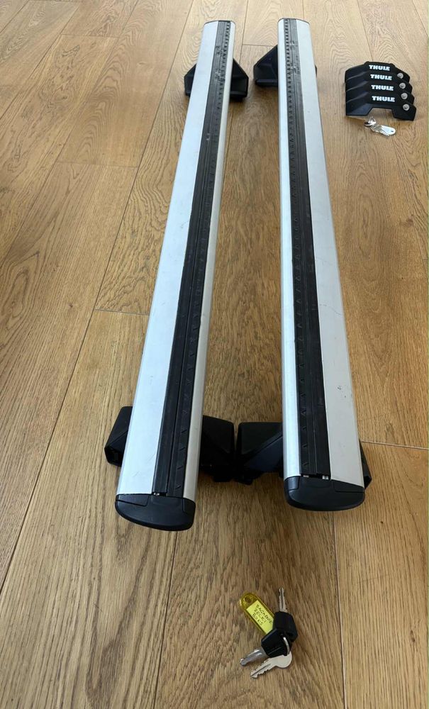 Zestaw belek Thule Wingbar + stopy Evo Clamp 7105