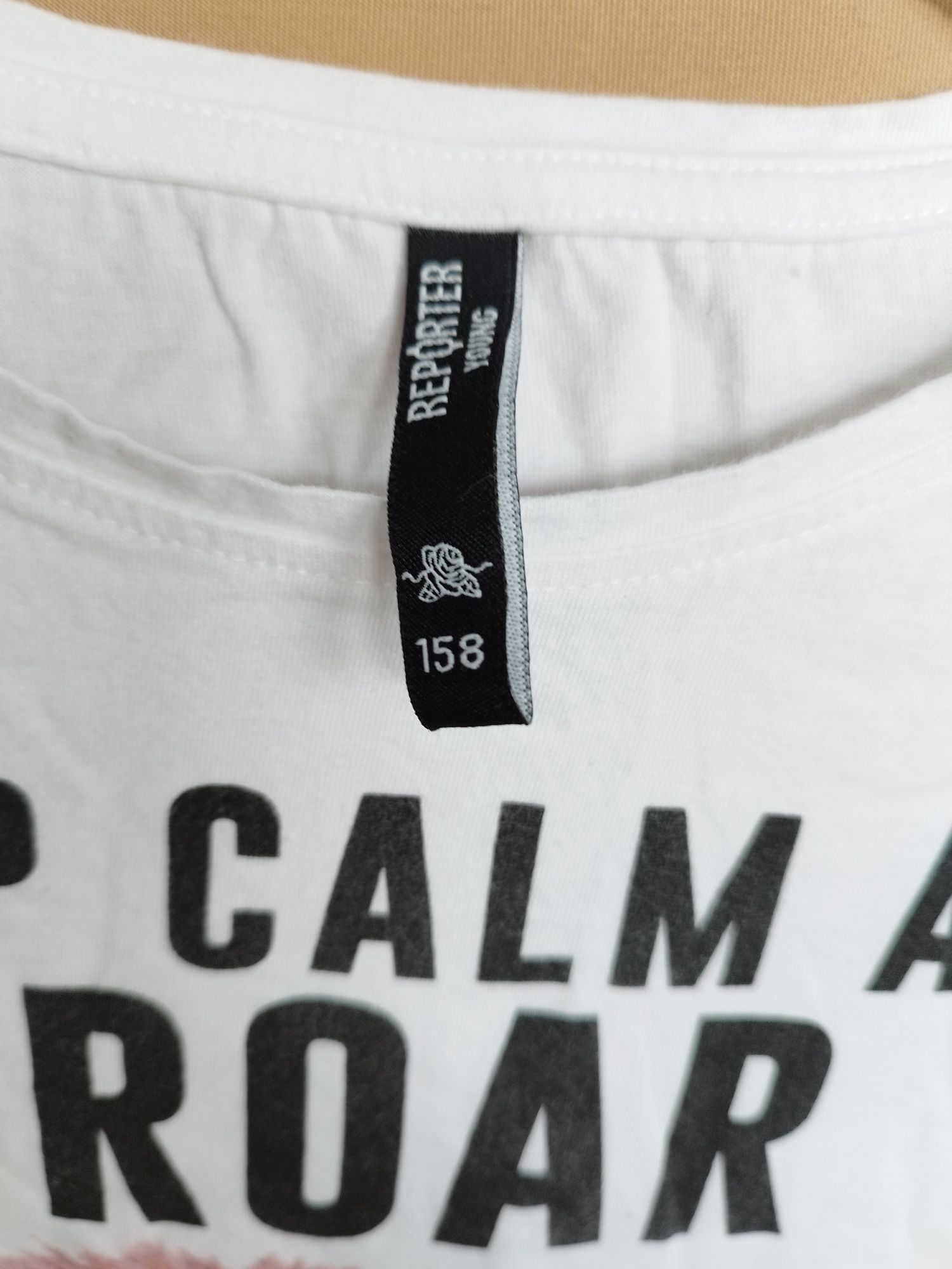 R.158 biała bluzka z lampasem lew długa t-shirt