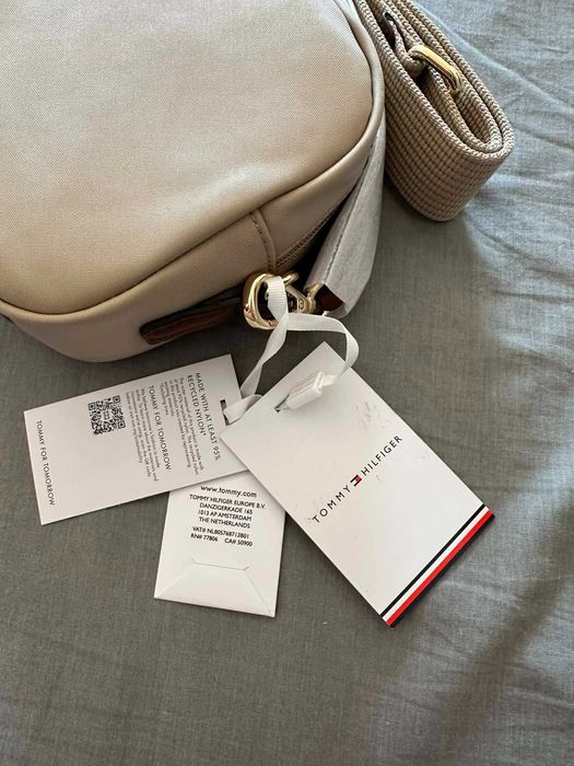 mala tommy nova e original