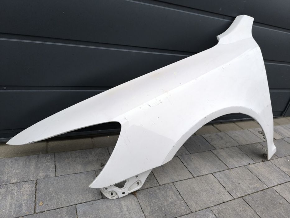 Błotnik lewy (od strony kierowcy) Skoda Octavia 2 FL