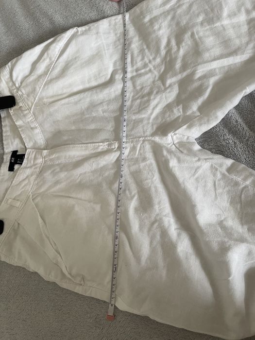 Білі лляні брюки