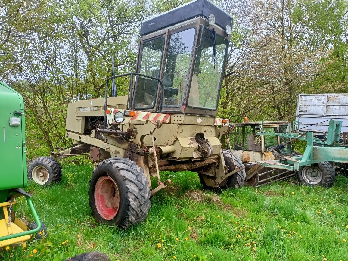 Pokosówka e 303 z hederem i obracarko grabiarką