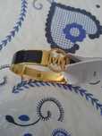 Pulseira Maichel Kors Preto e dourado