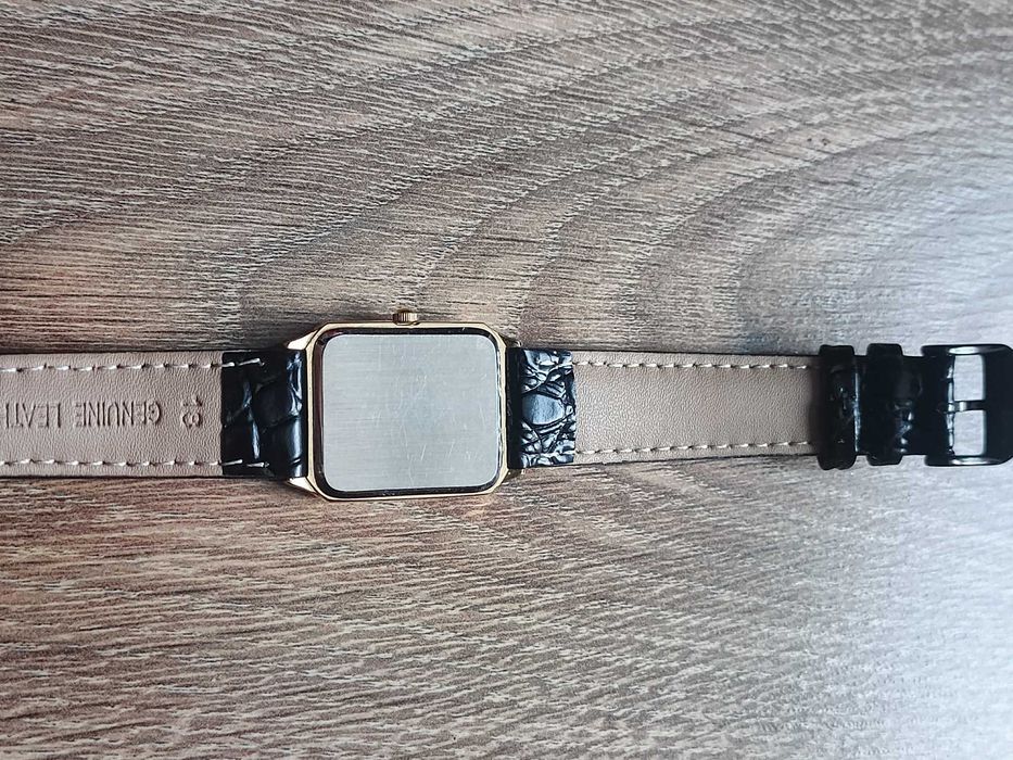 Sprzedam złocony męski zegarek garniturowy Deloitte & Touche