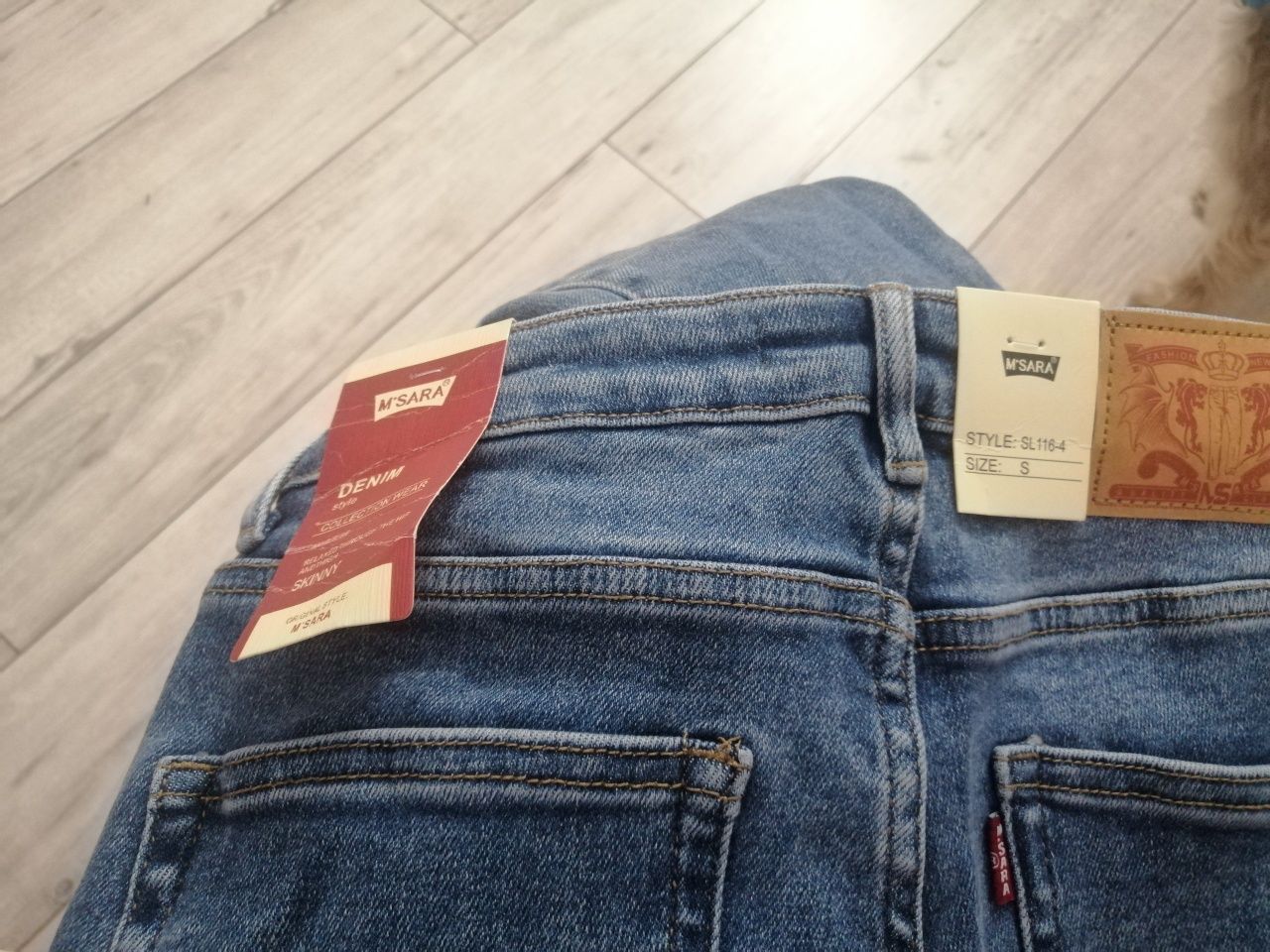 Nowe jeansy z metką