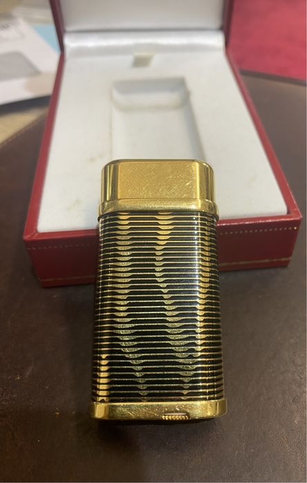 Isqueiro dourado Cartier “ Piton “