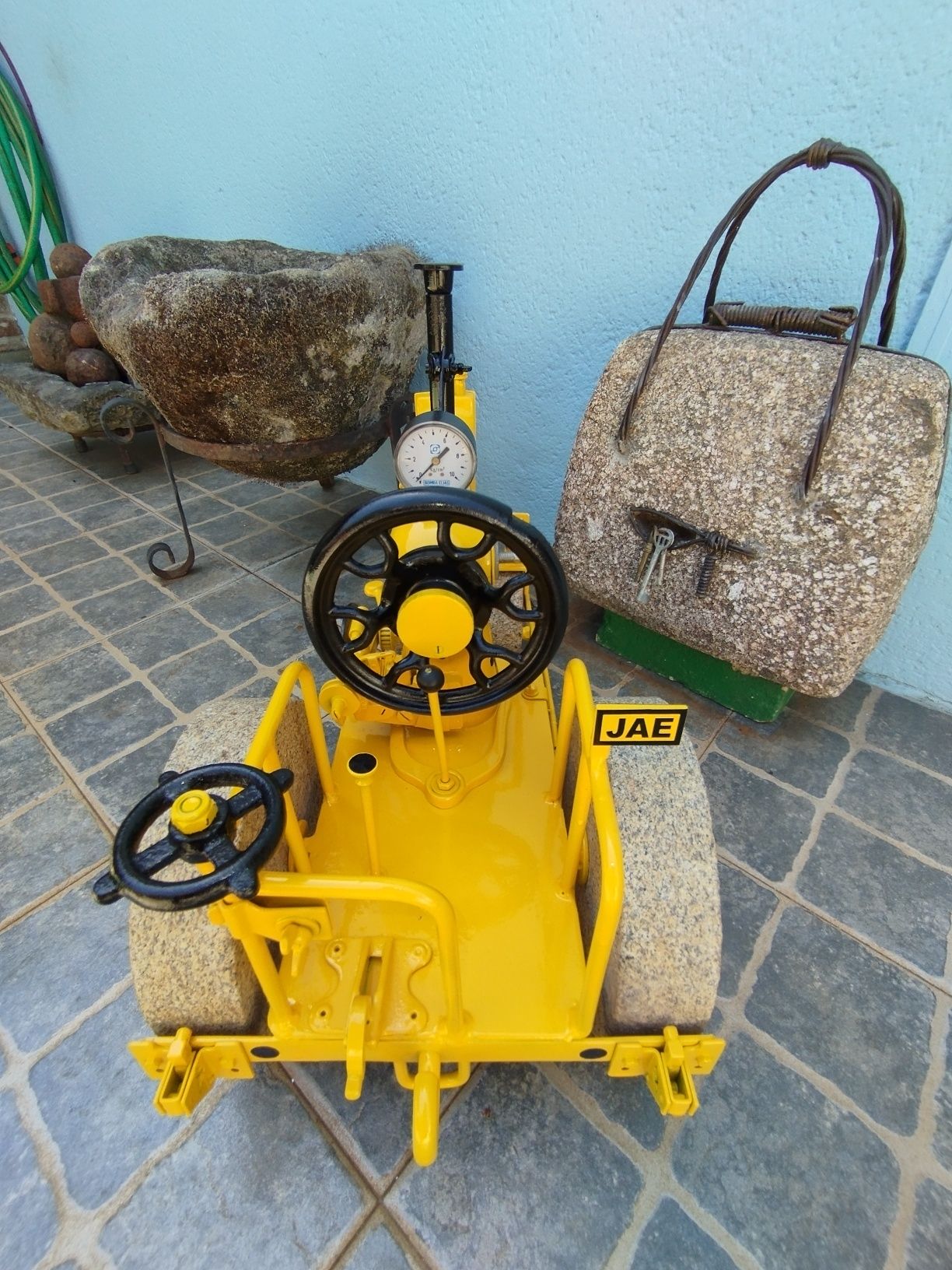 Máquina costura cilindro em pedra