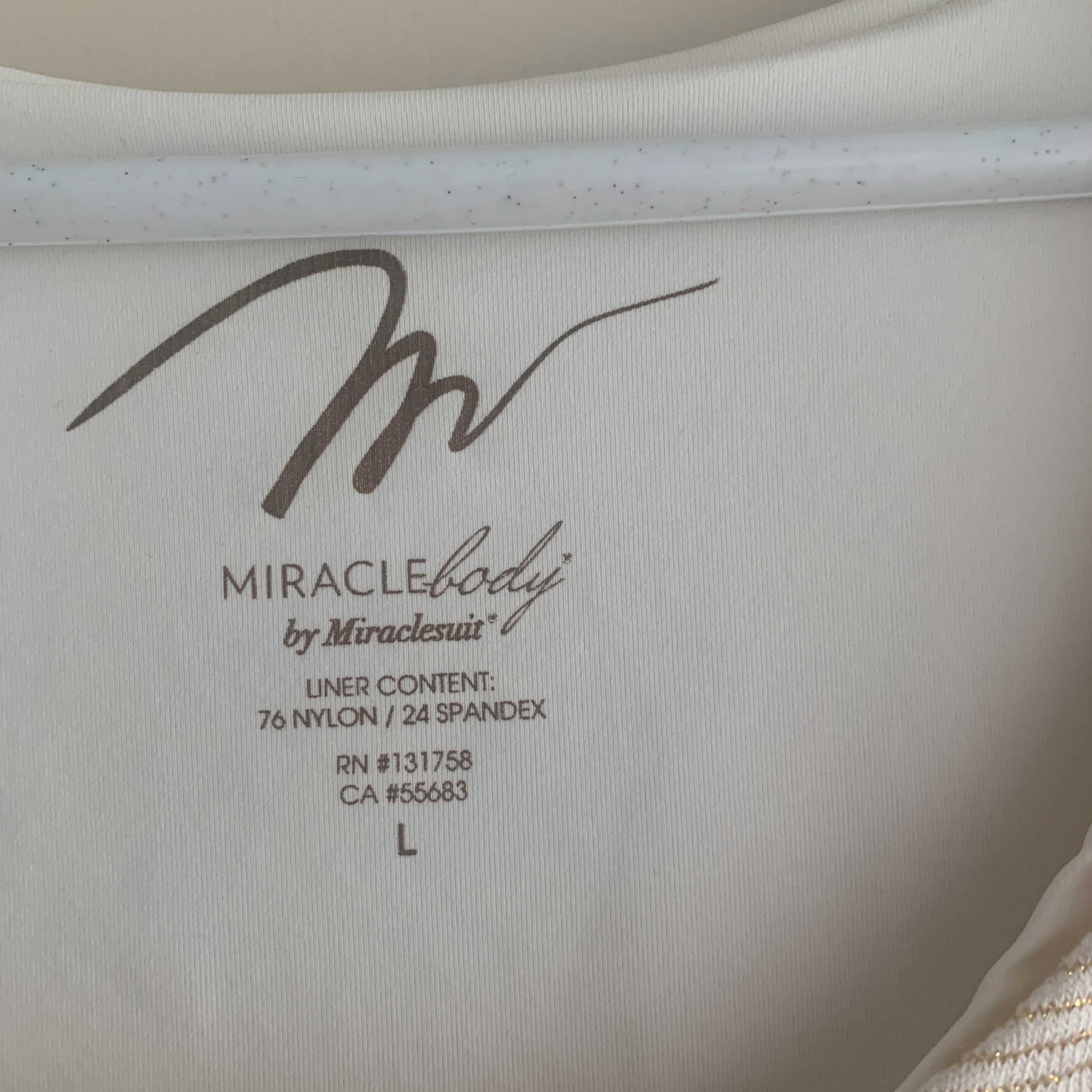 Kardigan ze złotą nitką. L -Miracle body.