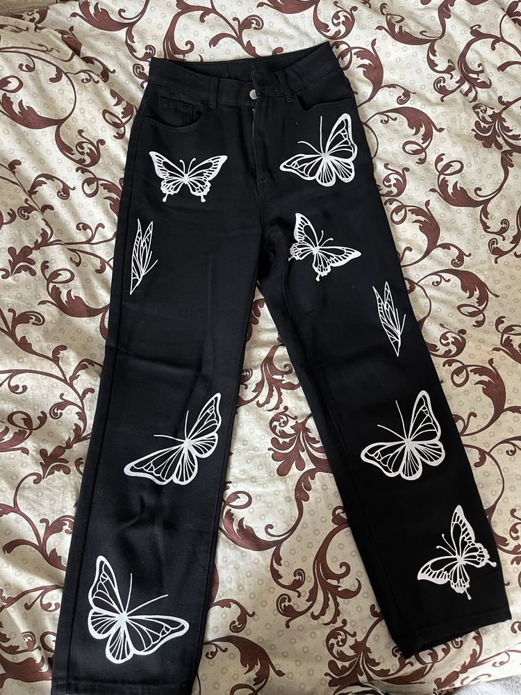 джинси з метеликами