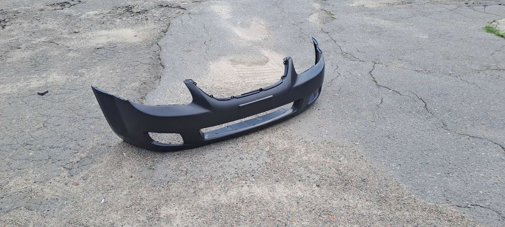 Бампер Kia Cerato 06–09 р