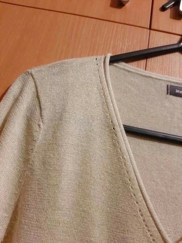 Bluza z brokatem XS
IN EXTENSO
