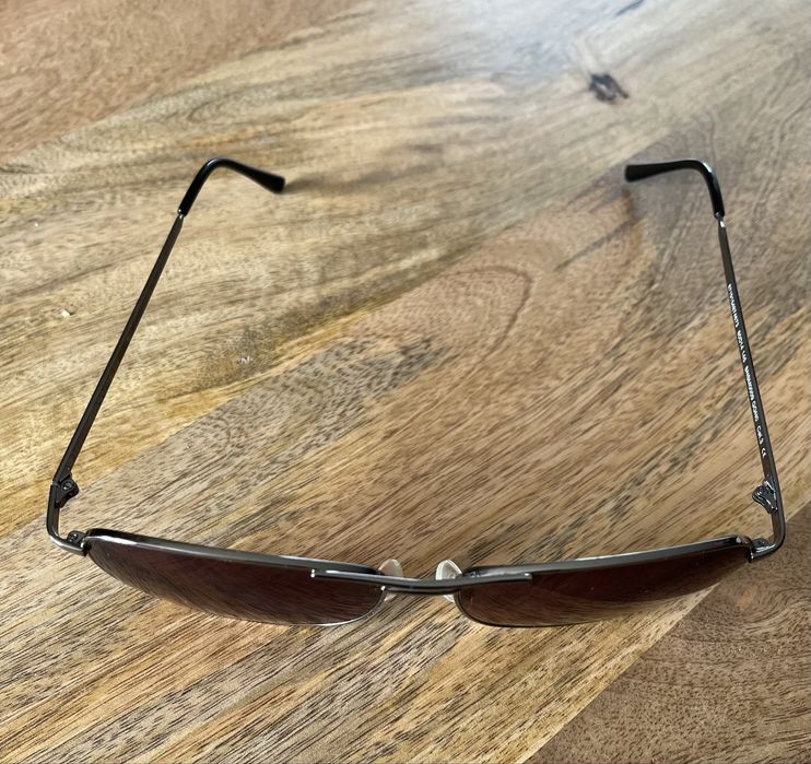 Okulary korekcyjne przeciwsłoneczne Vision Express P -1,0 L -0,75