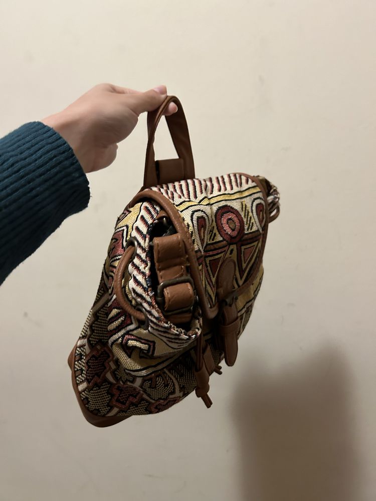 Mala tipo mochila castanha