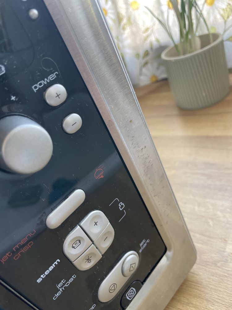 Kuchenka mikrofalowa mikrofalówka Whirpool z funkcją grilla VT256\IX