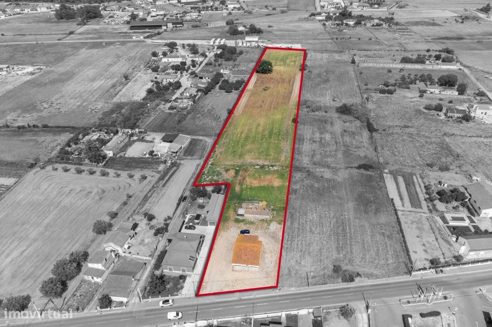 Lote de Terreno com Moradia