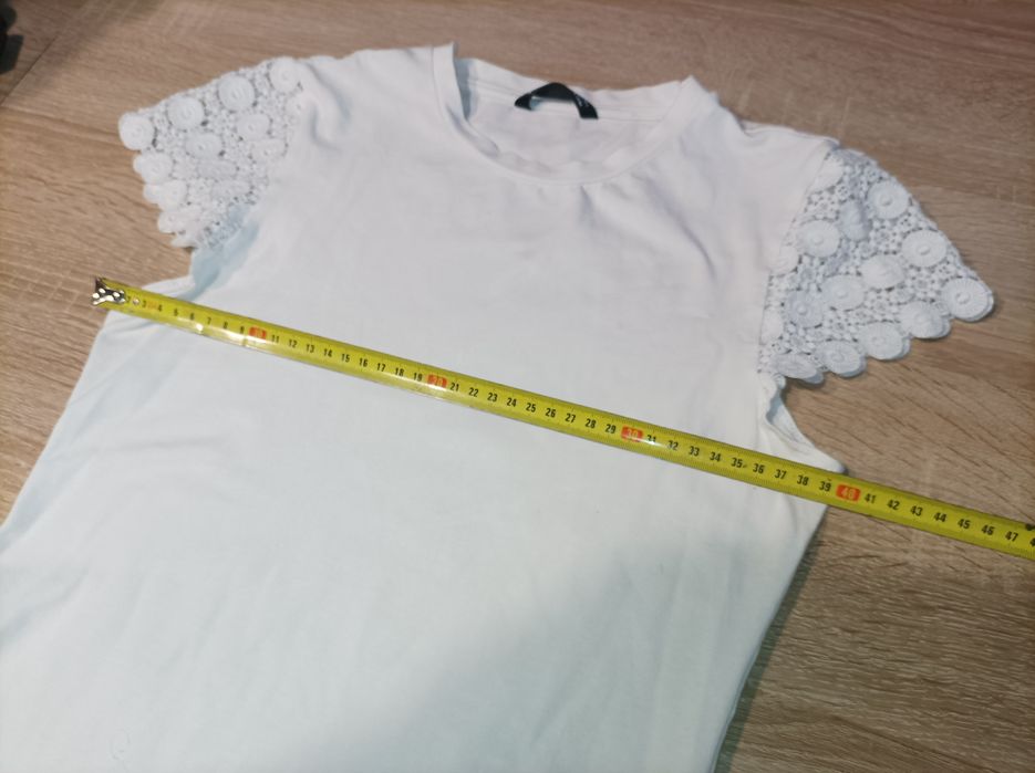 Biała bluzeczka rozmiar ok 140
