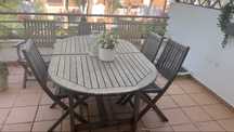 Mesa extensivel de teca + 6 cadeiras e almofadas