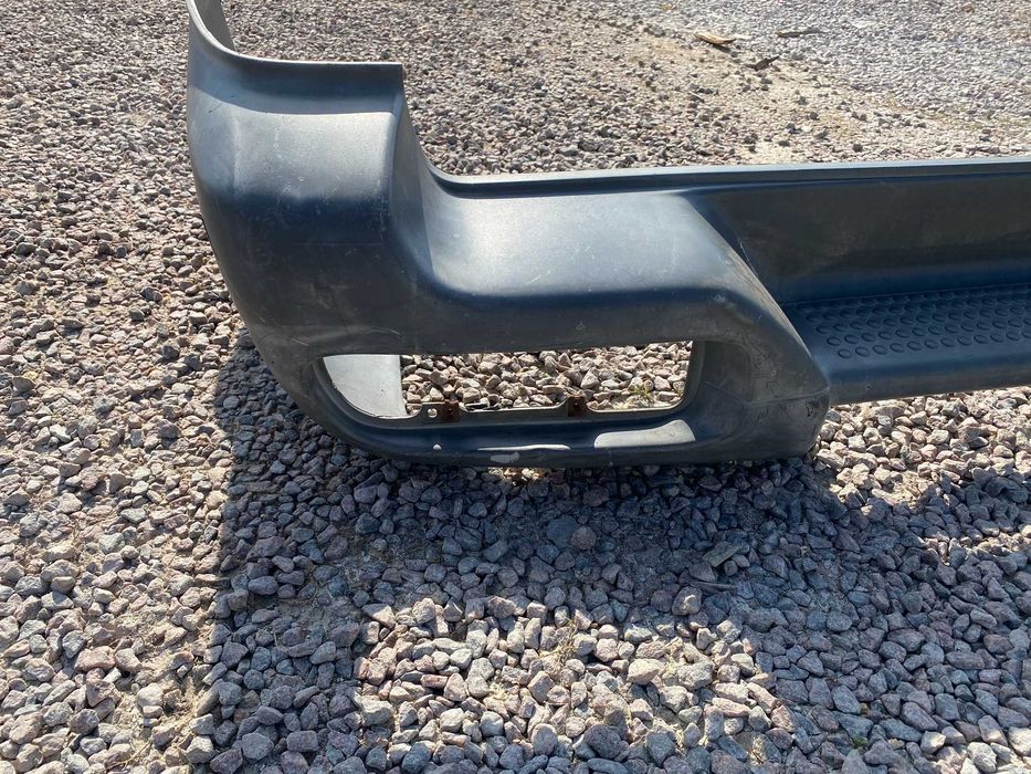 Бампер задній Nissan Terrano I