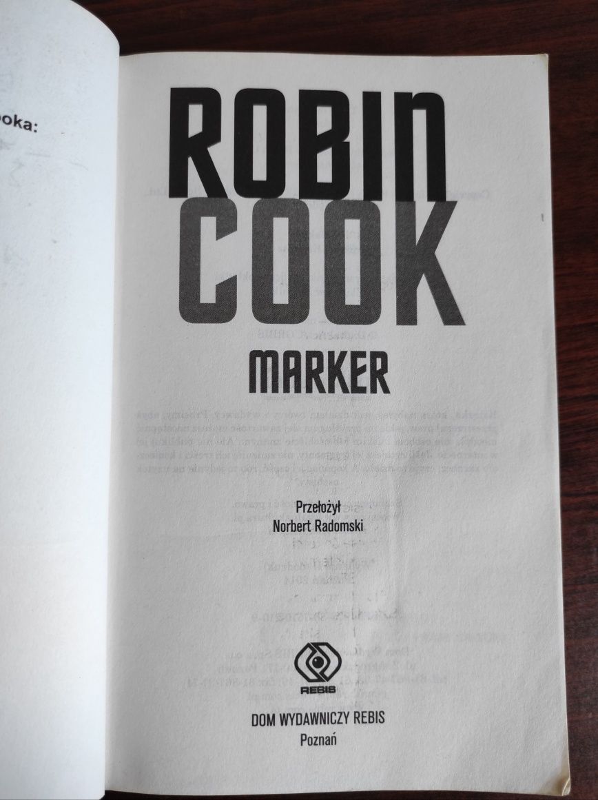 Książka Marker autor Robin Cook, oprawa miękka.

„Marker” to thriller