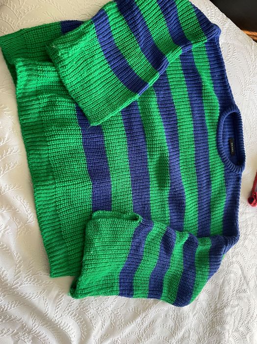 Camisolas e porta moedas