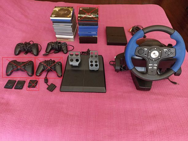 Consola PlayStation PS2 com kit de condução, comandos e vários jogos