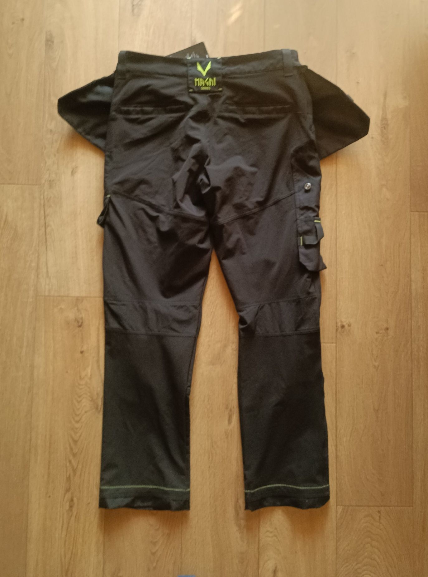 HELLY HANSEN nowe spodnie robocze MAGNI, r. C54