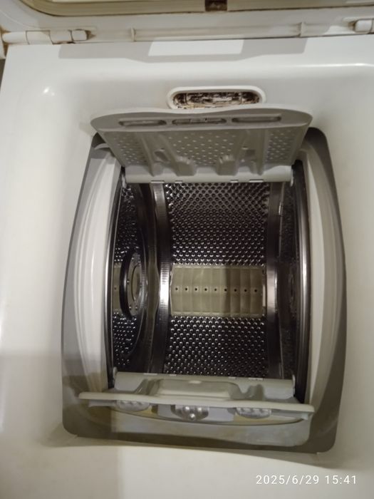 Продам стиральную машину вертикальной загрузки.