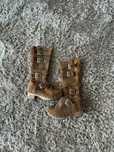 Botas cano alto com fivelas XUZ