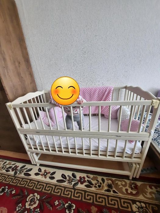 Дитяче ліжечко на маятникові