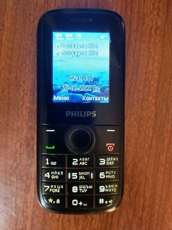 Мобильный кнопочный мини-телефон Philips E120.