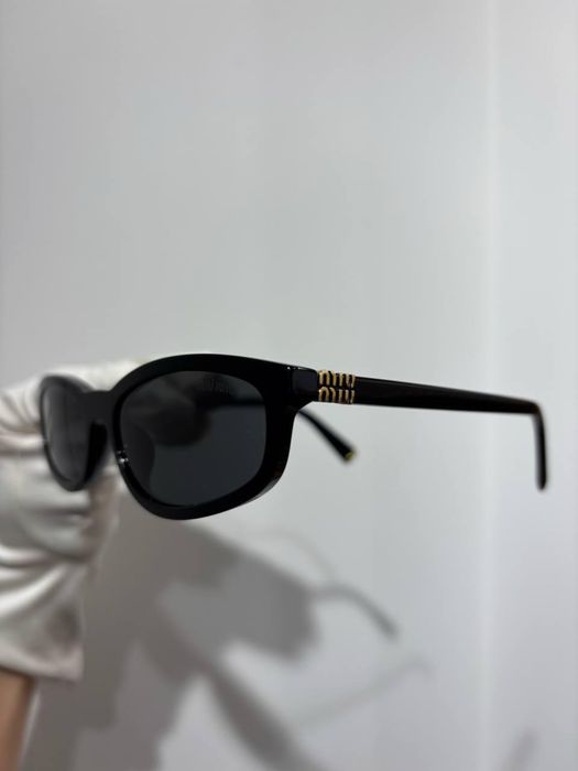 Окуляри MIU MIU