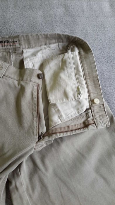 Eleganckie sportowe   spodnie męskie M pas 86 cm