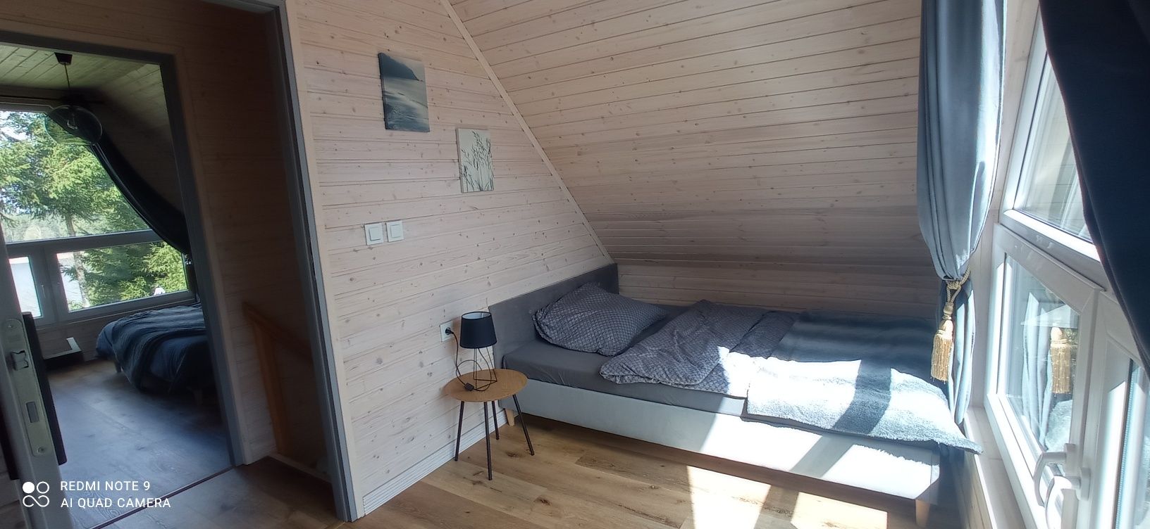 Chatka Leo domek nad jeziorem z balią do wynajęcia