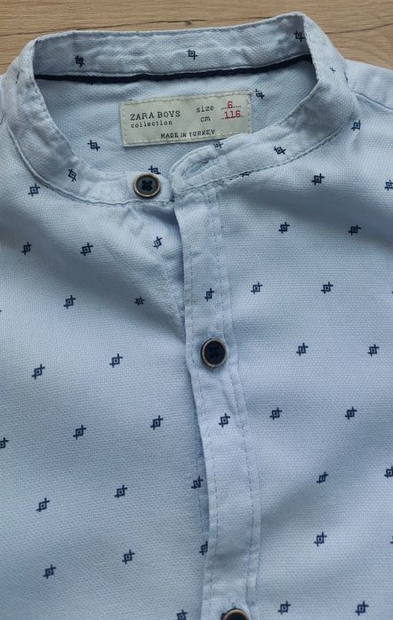 Koszula Zara 116 dł rękaw jasnoniebieska z drobnym wzorem stójką