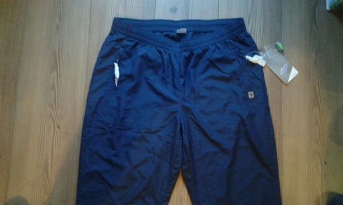 WYPRZEDAŻ Nowe spodnie dresowe firmy 4f męskie rozmiar M