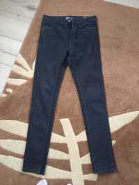Spodnie jeans skiny firmy sinsay