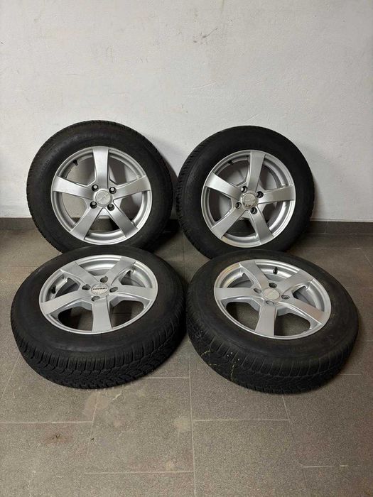 Komplet alufelgi 4x100 opony zimowe 185/65R15 Dunlop 2024