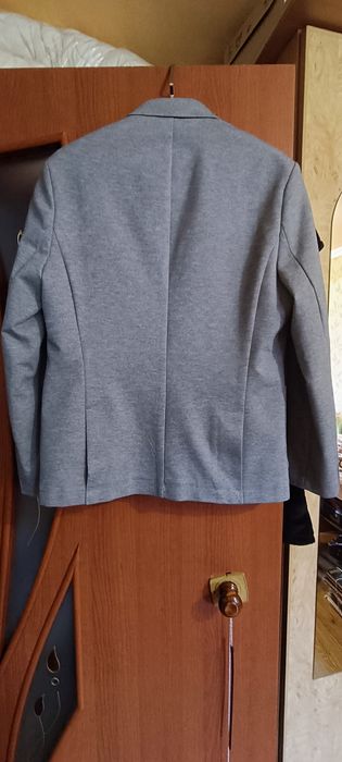 Трикотажний піджак. Стан нового.