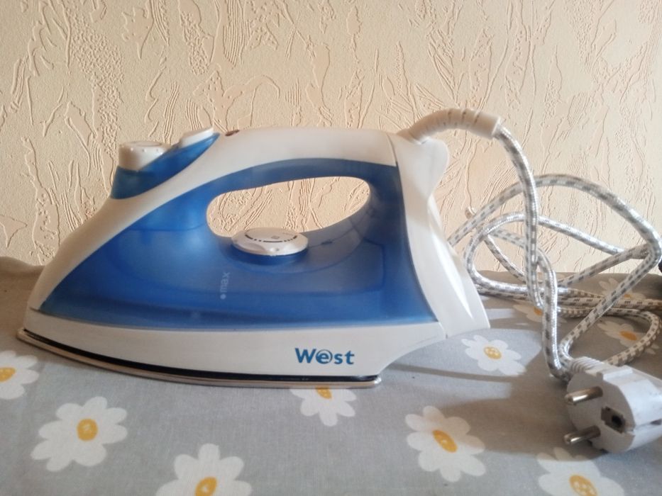 Паровой утюг новый