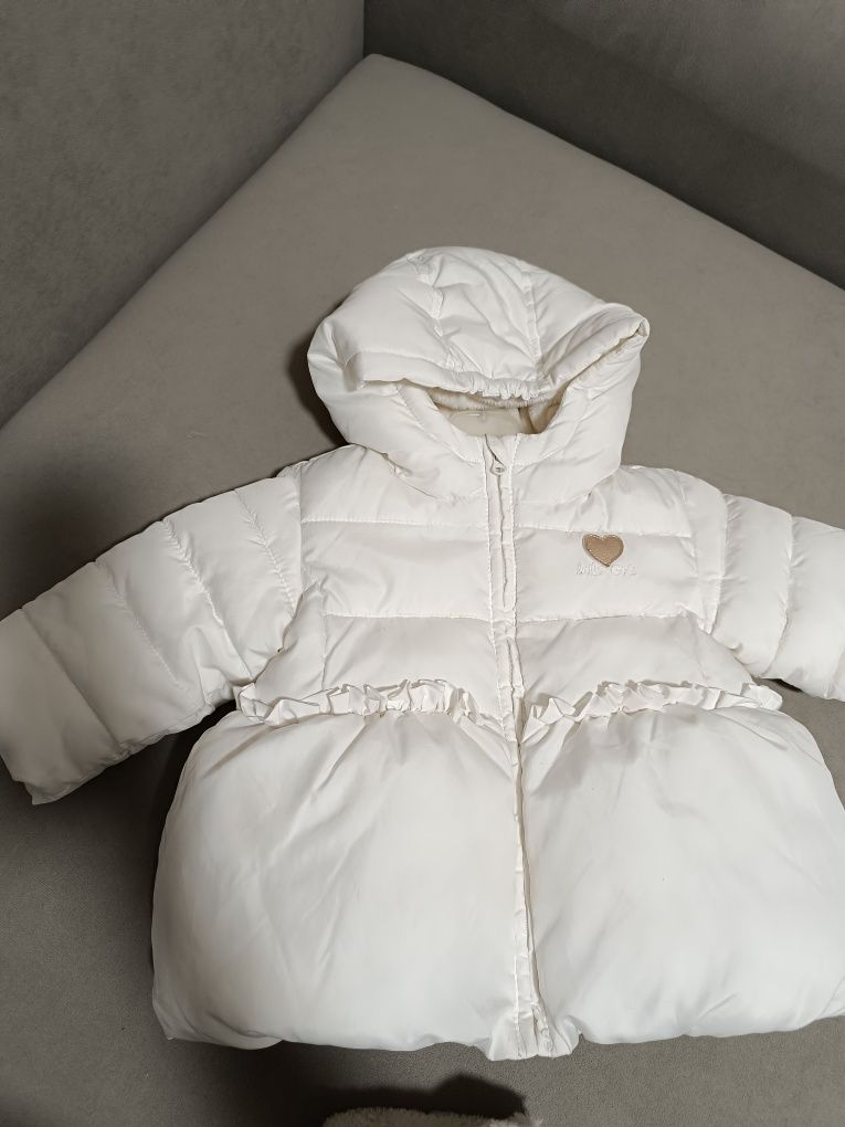 Зимова курточка  білого кольору