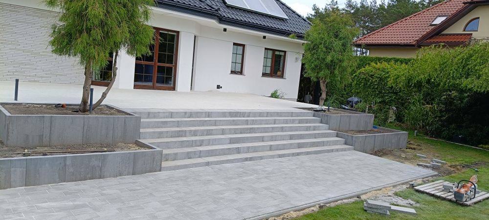 Układanie kostki brukowej brukarstwo odwodnienia równanie terenu