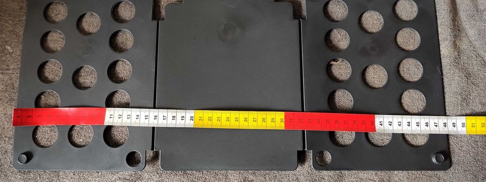 Dobrador roupa crianças