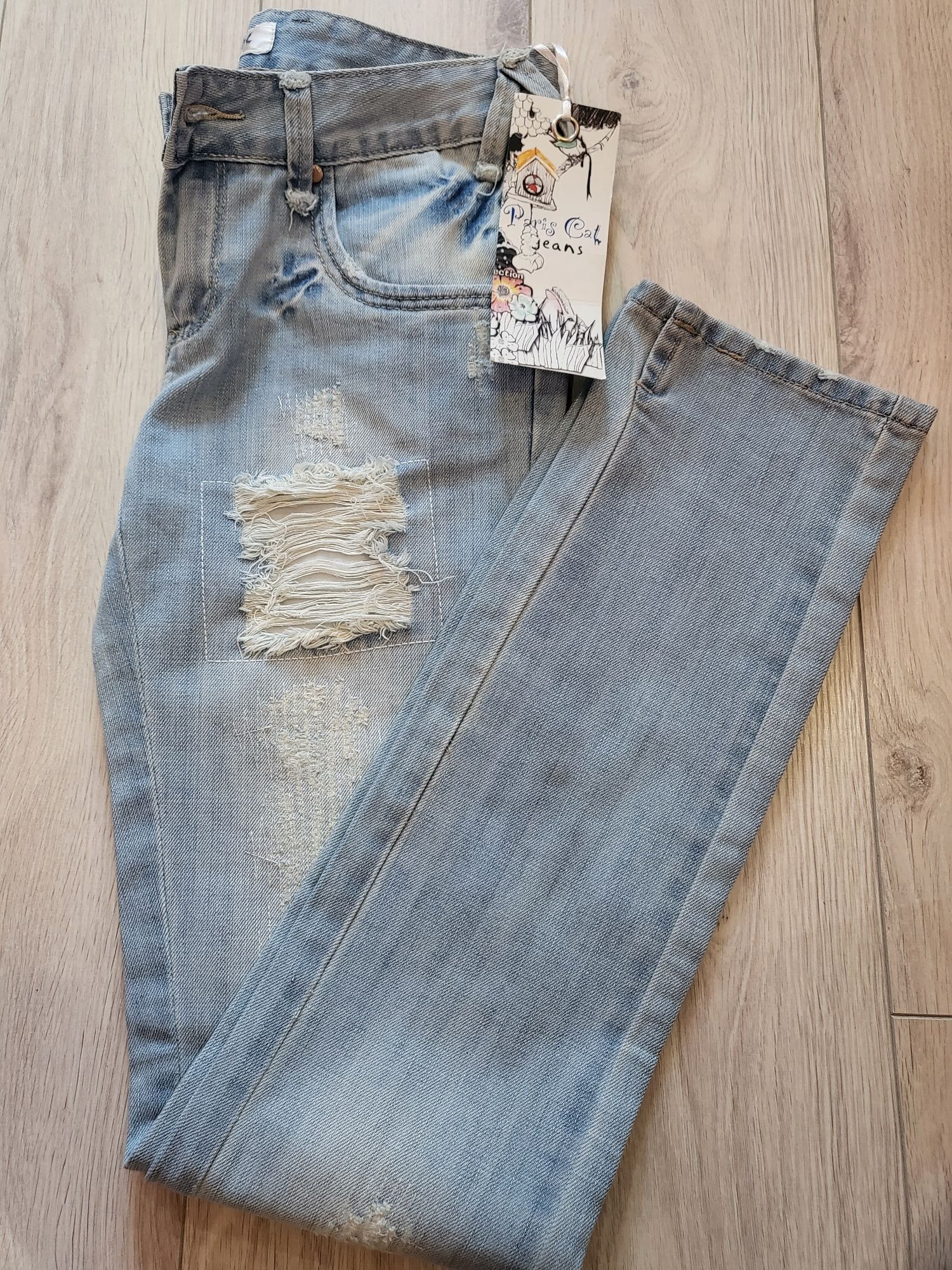 Nowe spodnie jeans rurki przetarcia