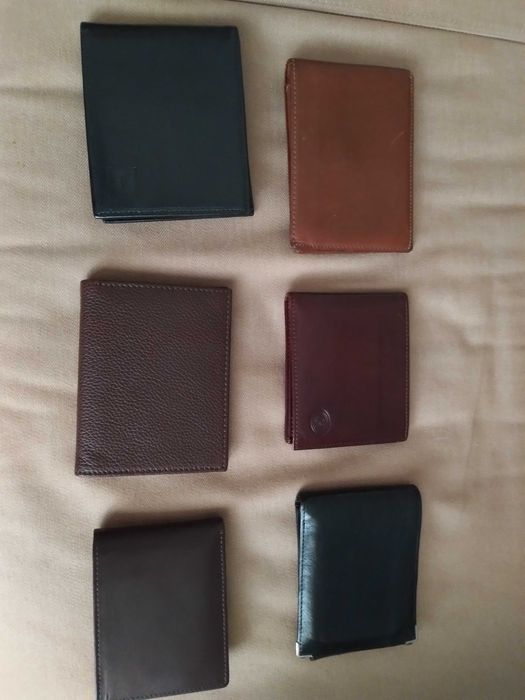 Diversas carteiras homem em pele