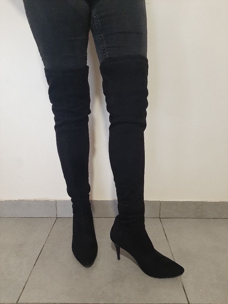 Botas acima do joelho
