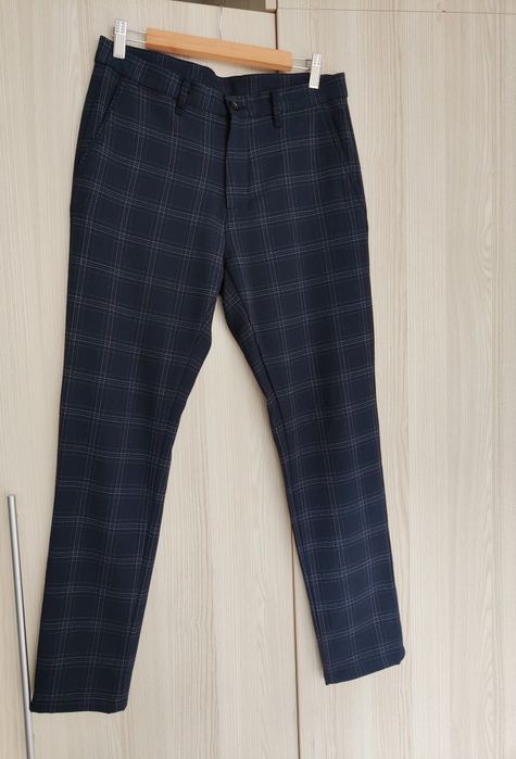 Męskie materiałowe spodnie w kratę, Zara, r. 38