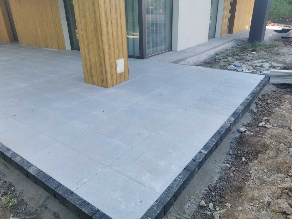 Brukarstwo Układanie kostki brukowej.