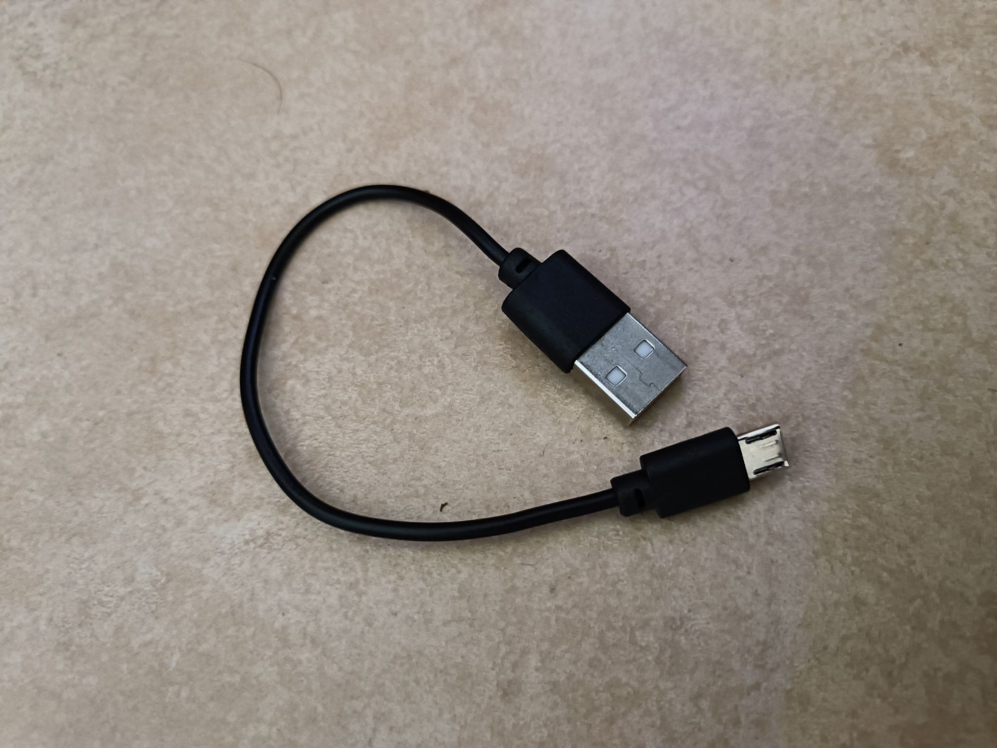 Auricular Bluetooth esportivo recarregável com cabo USB - novo