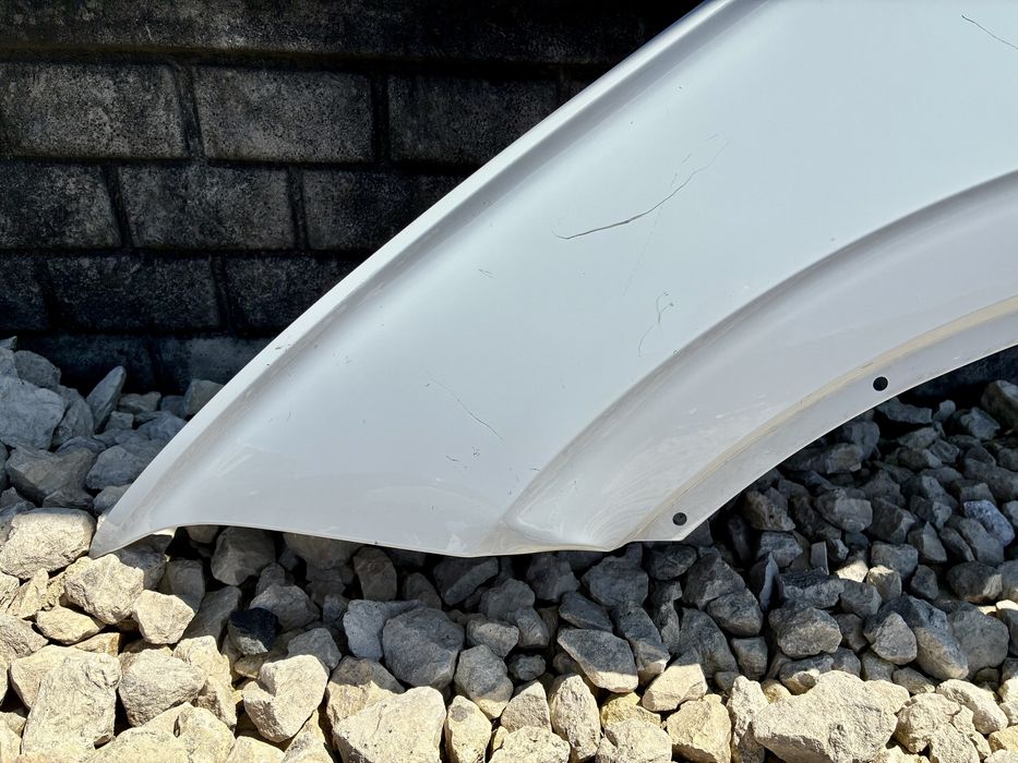 Blotnik przedni lewy LC9A VW Touareg 3 III 760 18- oryginal