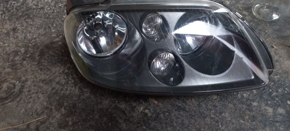 Фара caddy  touran
